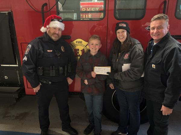 Declan donating groceries