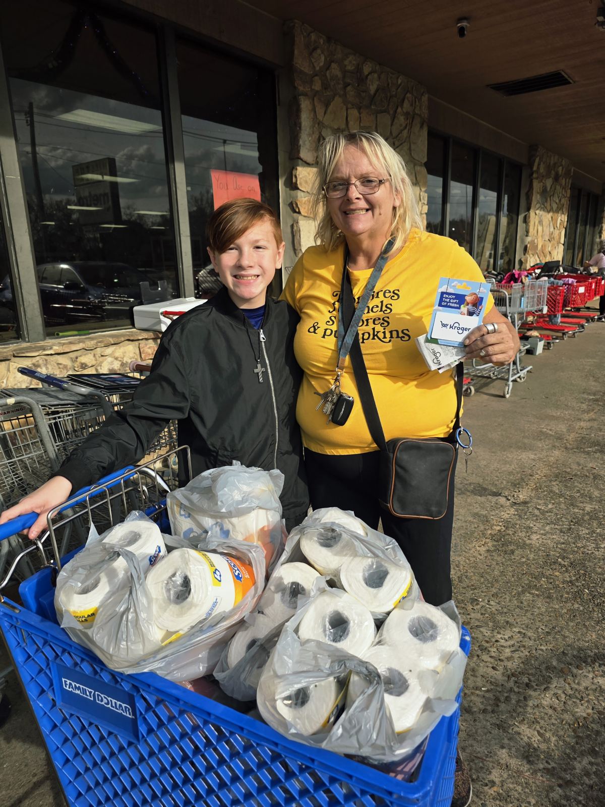 Owen donating essential items and a Kroger gift card to Brysonn's Closet