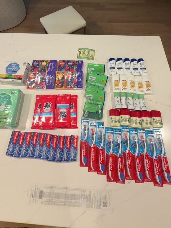 Brooklyn with hygiene products donated to Heartland Hope