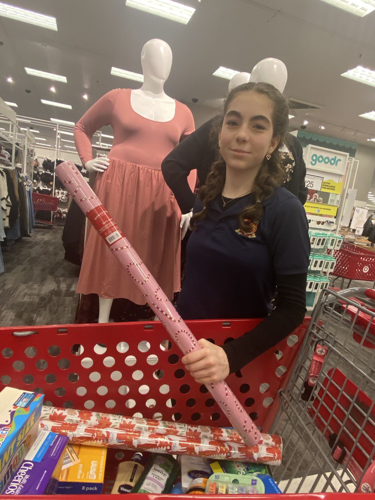 Emily with hygiene and food products purchased for Project 150